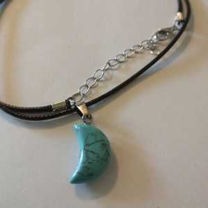 Crescent moon pendant